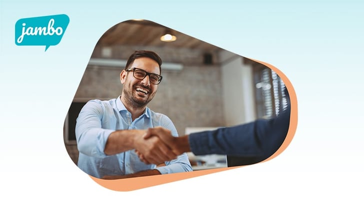 Man shaking hands with a stakeholder who has used stakeholder relationship management to build a strong elationship