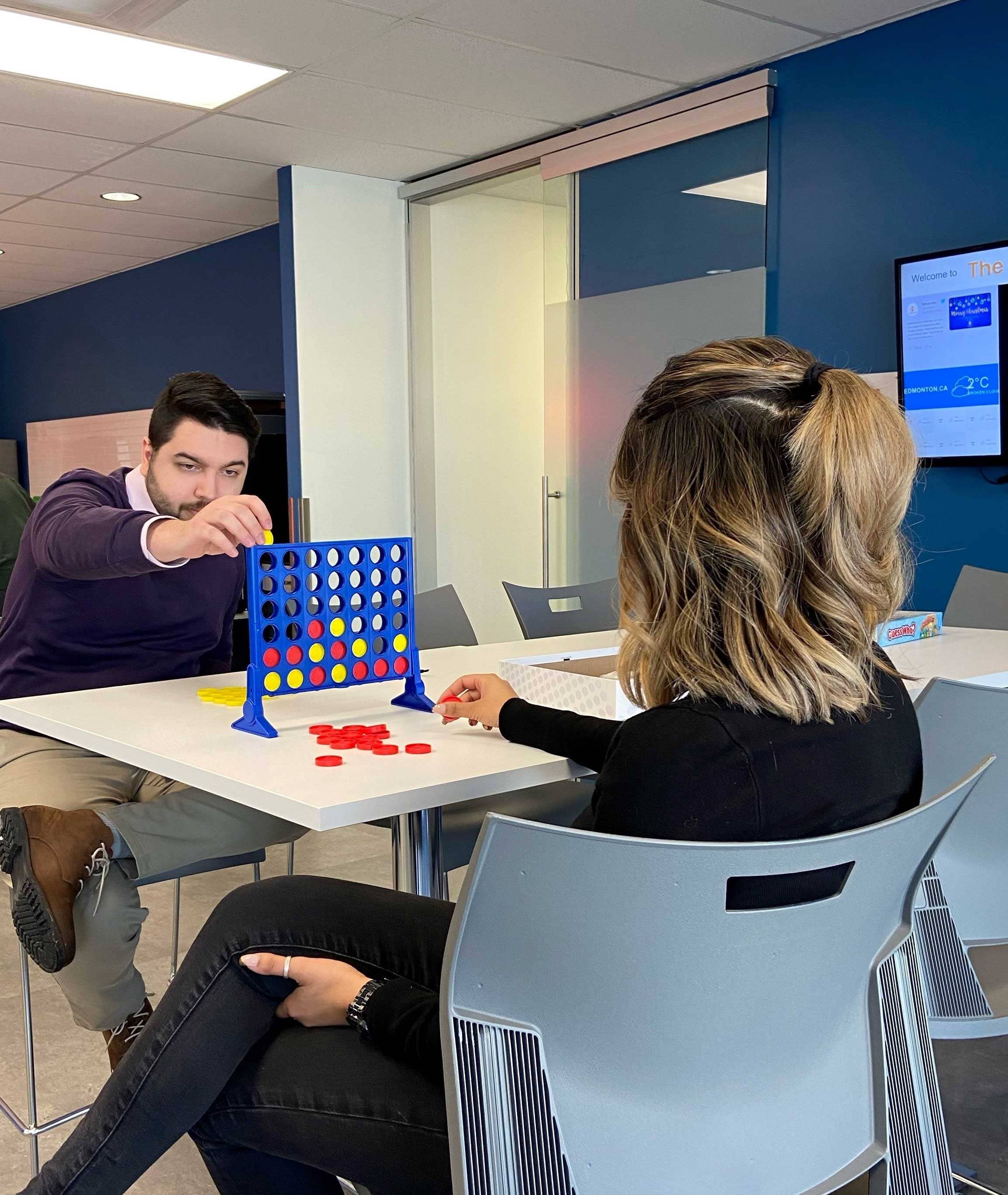 Ash and Azaali playing connect 4