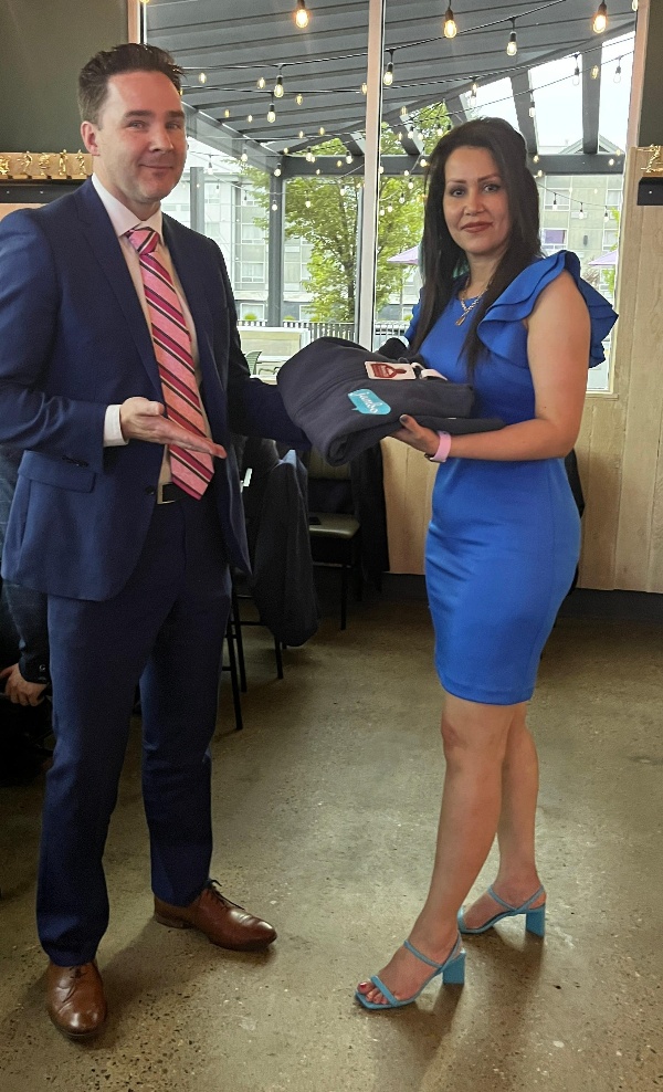 Shadi receiving her service award