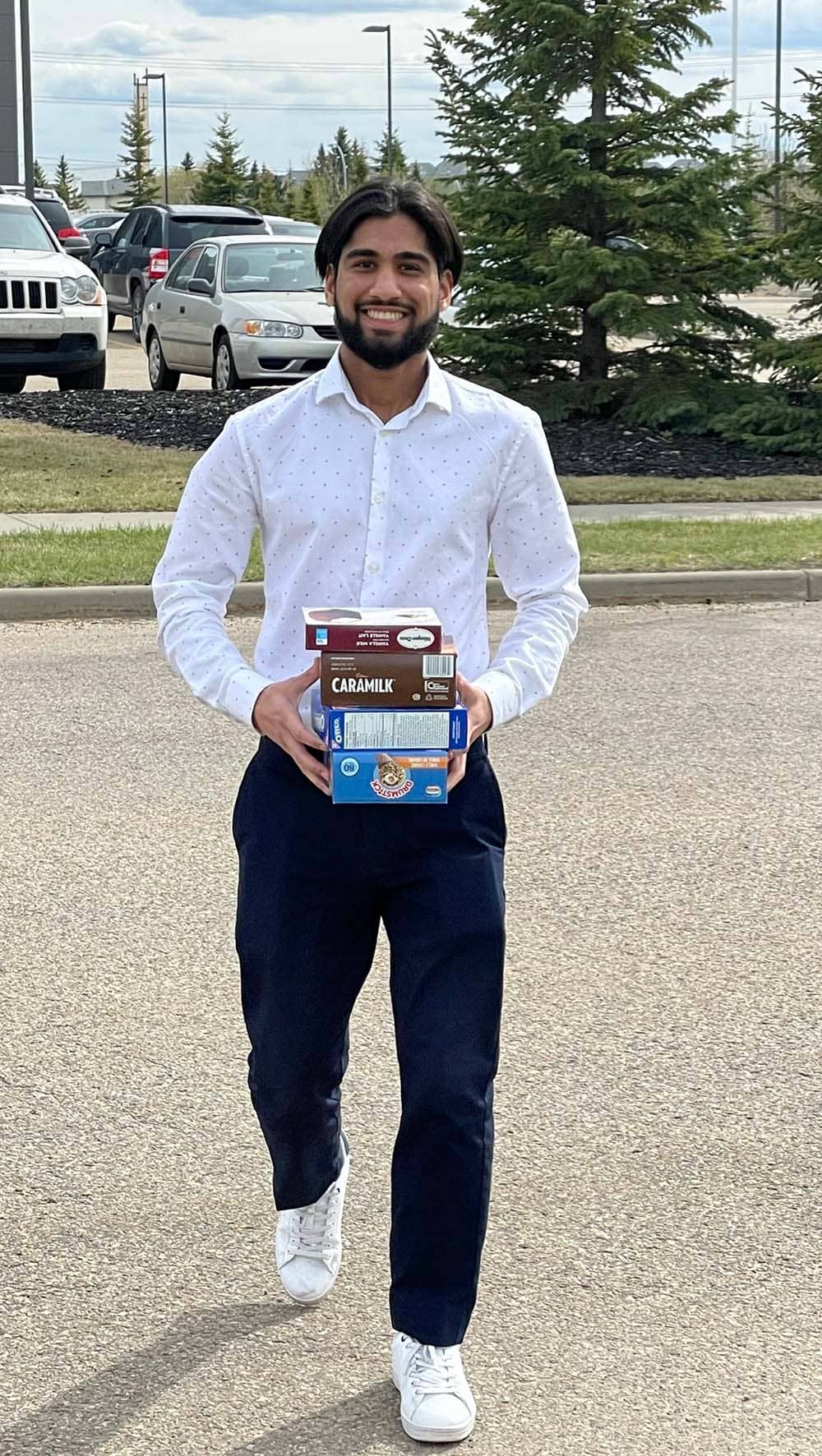 Jawad brings snacks to the clean up crew